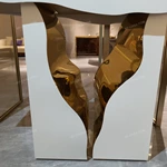Sculptural White Console Table with Fluid Cutout and Polished Gold Interior Core